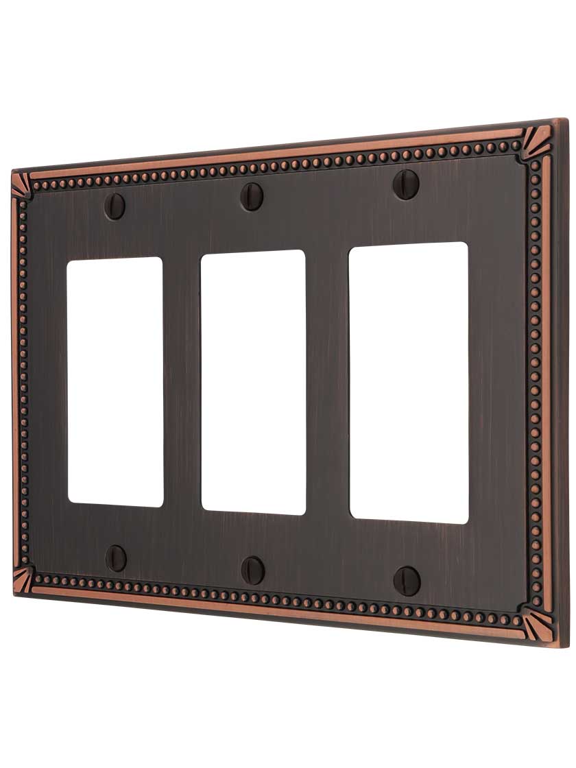 Imperial Bead Triple GFI Cover Plate in Aged Bronze.